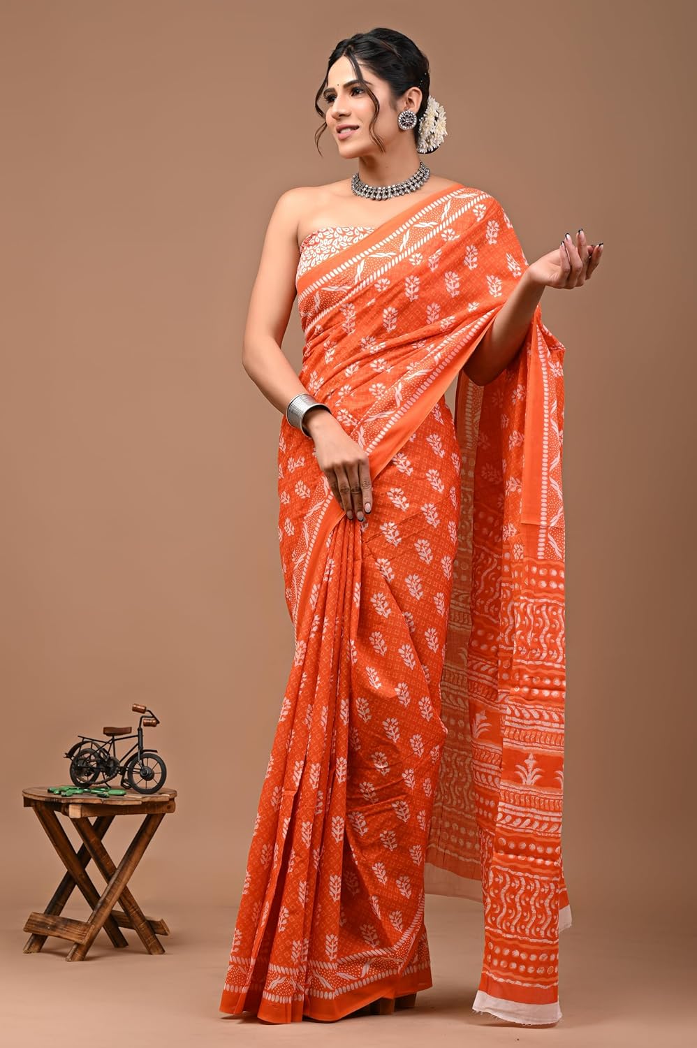 Cotton MulMul Orange Printed Sarees